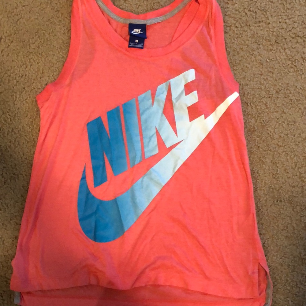 Pink Nike tank top with blue lettering